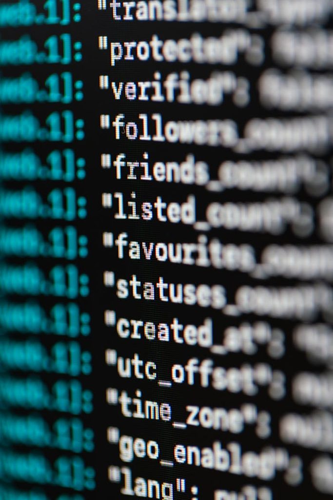 pexels-photo-3861976 Extreme close-up of computer code displaying various programming terms and elements.